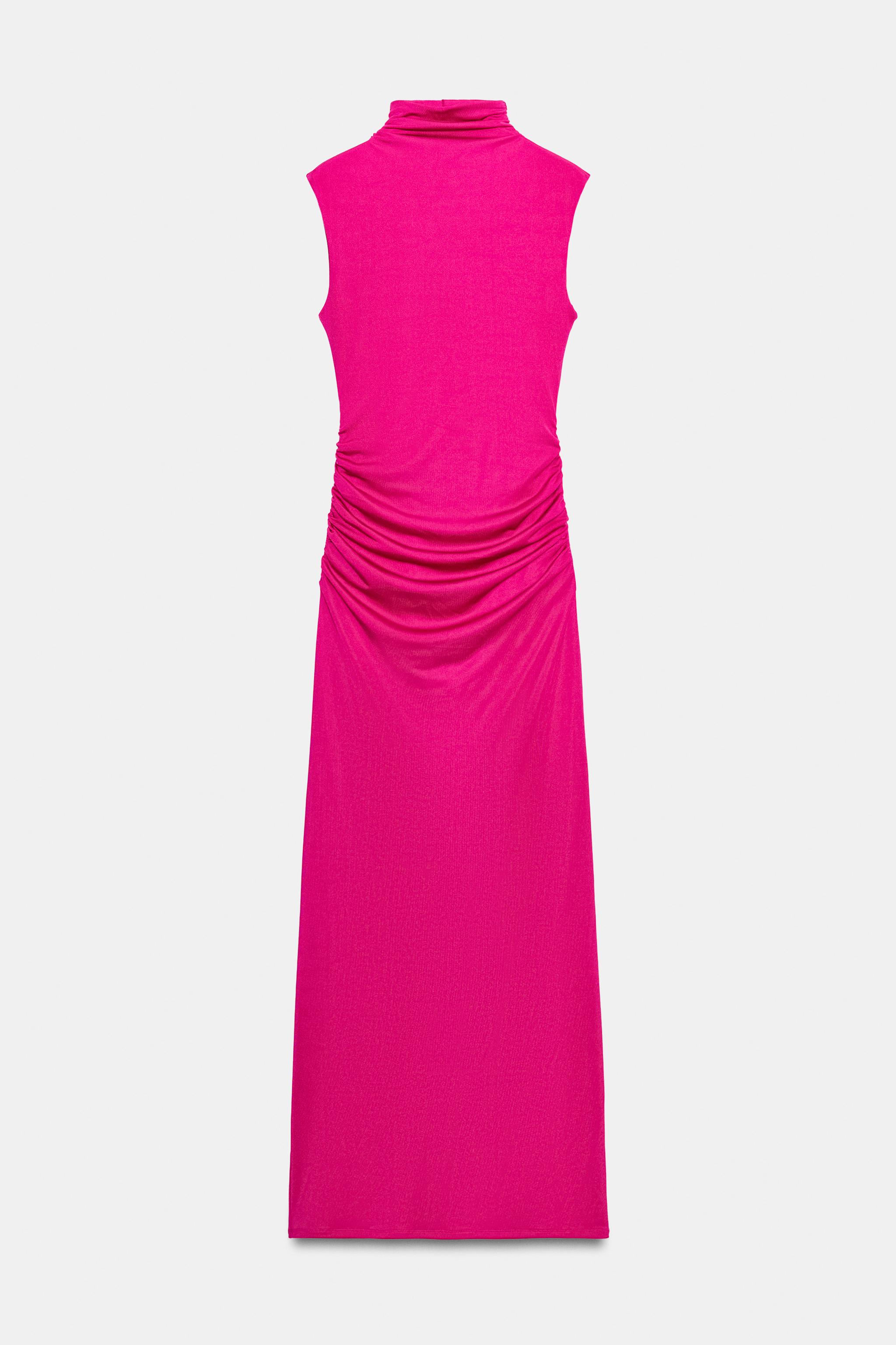 ROBE LONGUE À OUVERTURE AU DOS